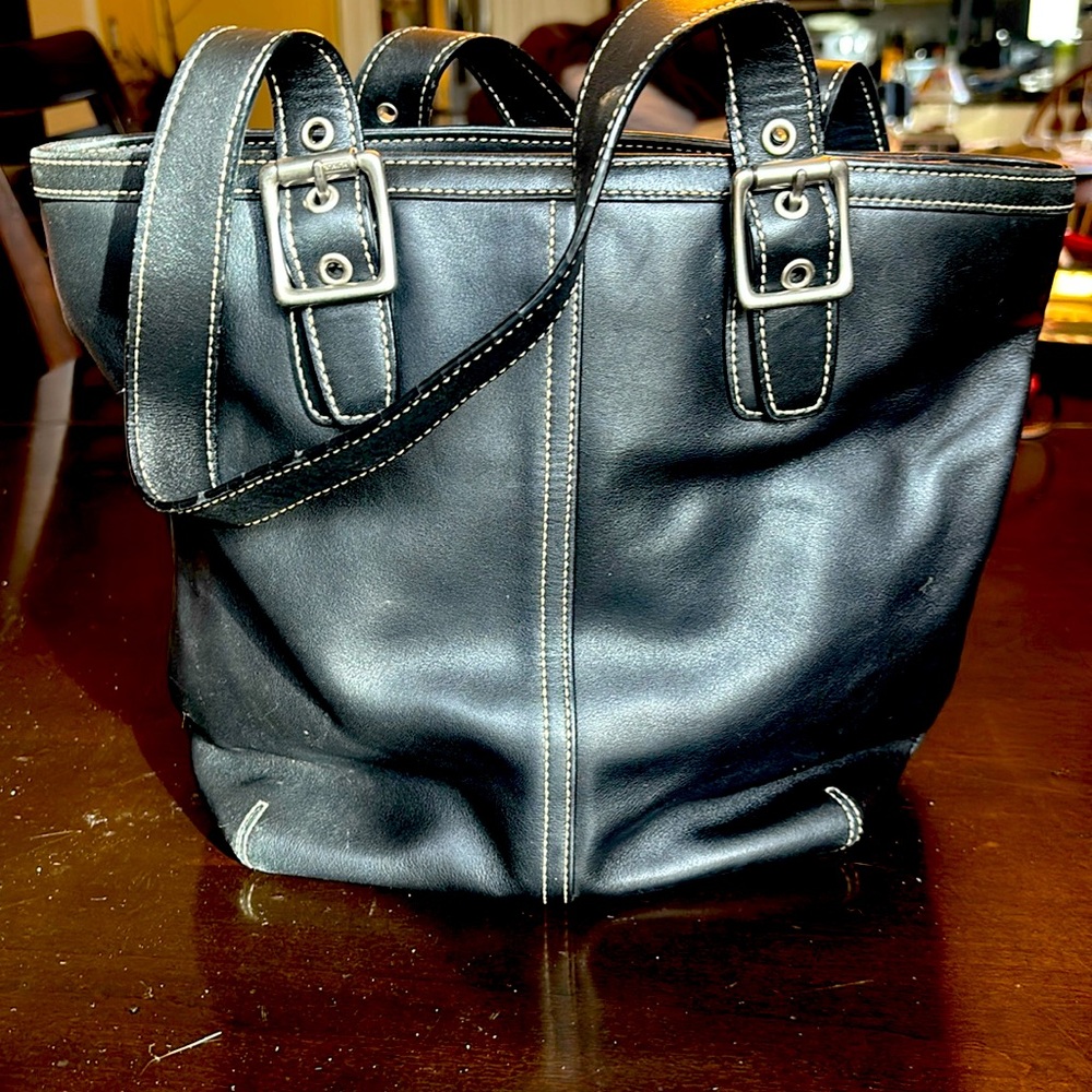 Vintage Coach black leather handbag, is a true class